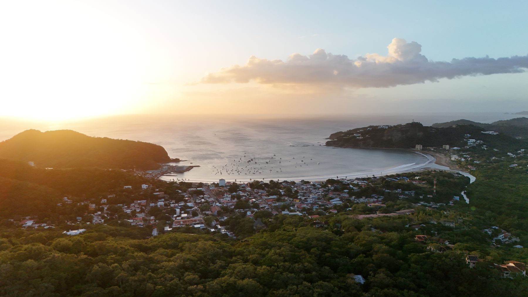 San Juan del Sur and its bay from the hills at sunset